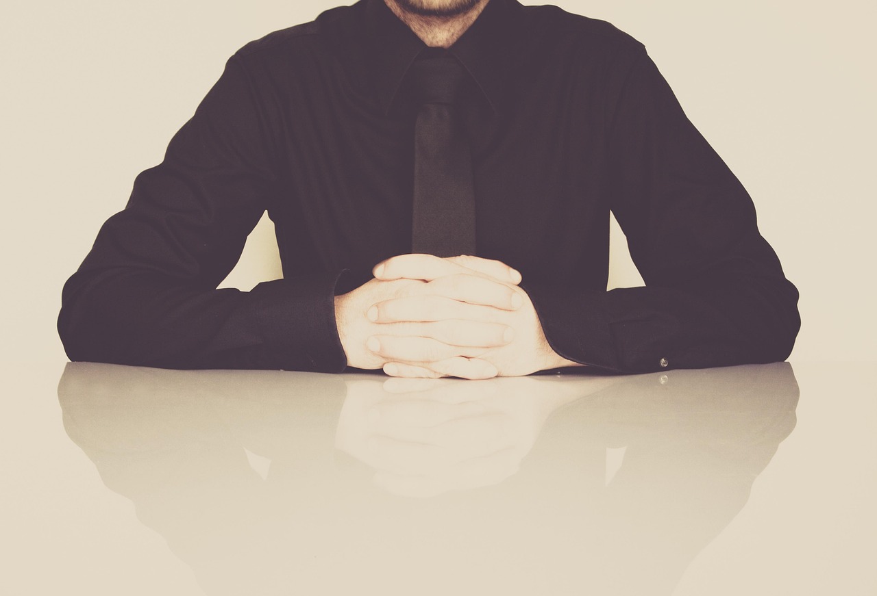 Businessman, office, necktie — Get Reliable Plumbing Solutions at Affordable Rates in Arlington